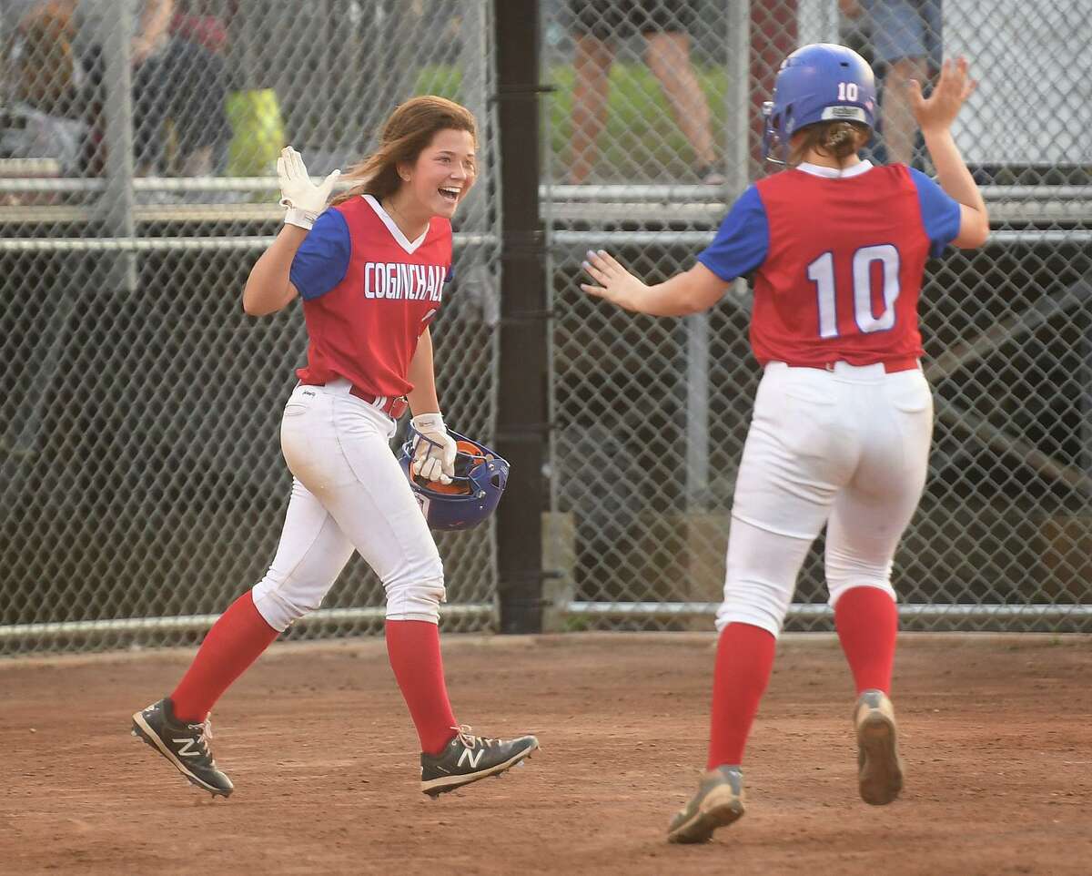 Coginchaug teammates Alayna Mariani, left, and Dana Boothroyd celebrate a run in the 4th inning of their Class S semifinal game with Notre Dame of Fairfield at DeLuca Field in Stratford, Conn. on Monday, June 7, 2021.