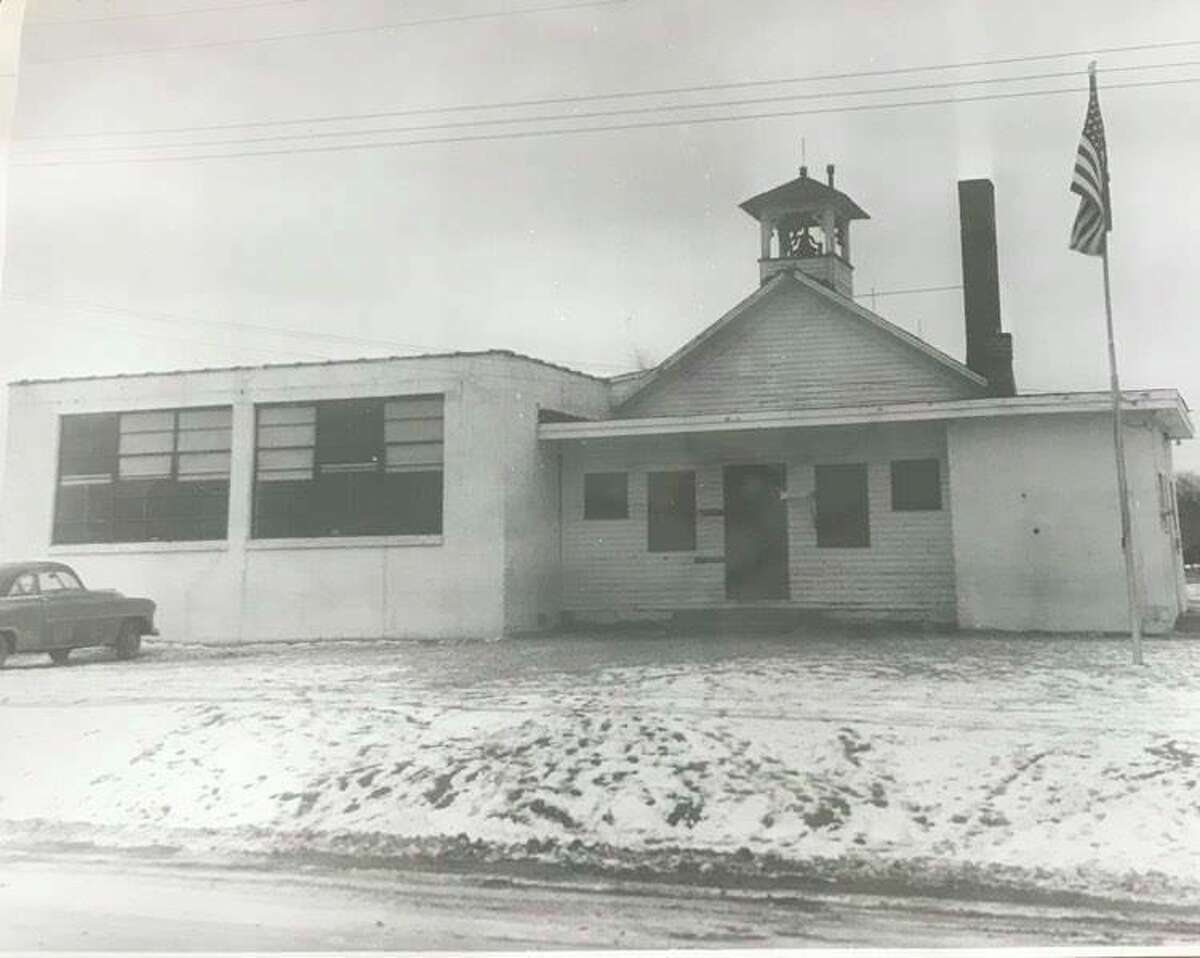 The original Cady school, with school bell on Sturgeon Road. Cady had two additions since the building was first constructed. January 1956