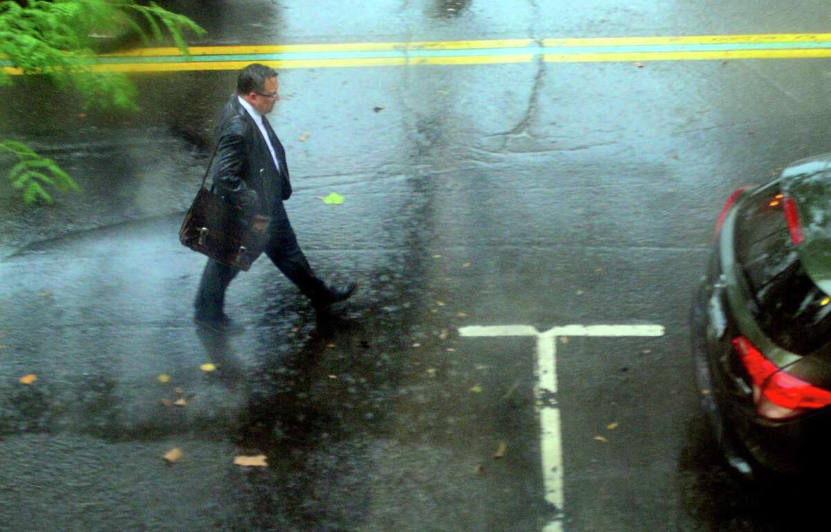 A serious thunderstorm passes through downtown Bridgeport, Conn., on Tuesday, July 17, 2018.