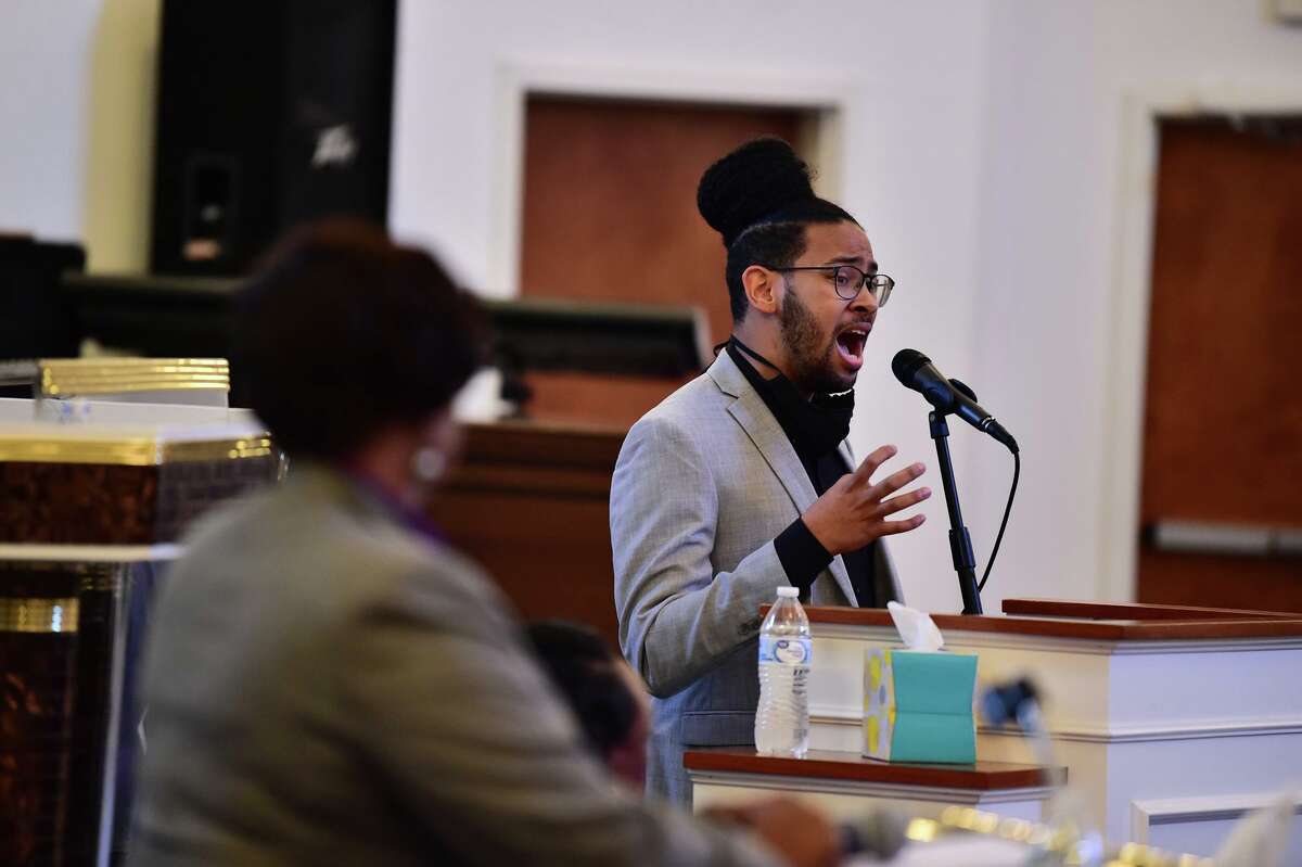 Jalen McKee-Rodriguez, seen here in a District 2 debate, is one of four new progressives elected to the City Council.