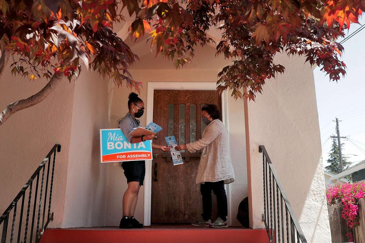 Mia Bonta and campaign manager Rowena Brown canvass in Oakland’s Glenview neighborhood.