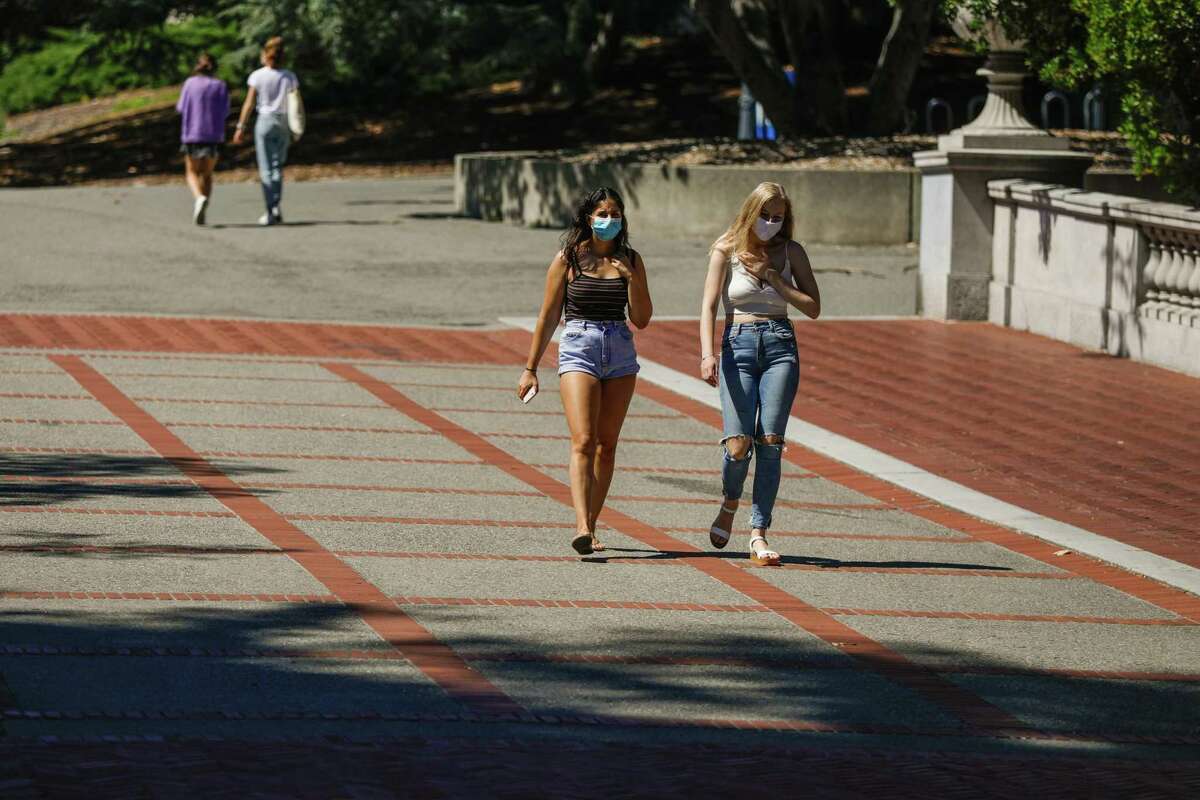 People walk through the UC Berkeley campus last July. The University of California admitted a record number of freshmen and community college transfer applicants this year in its most diverse undergraduate class ever.