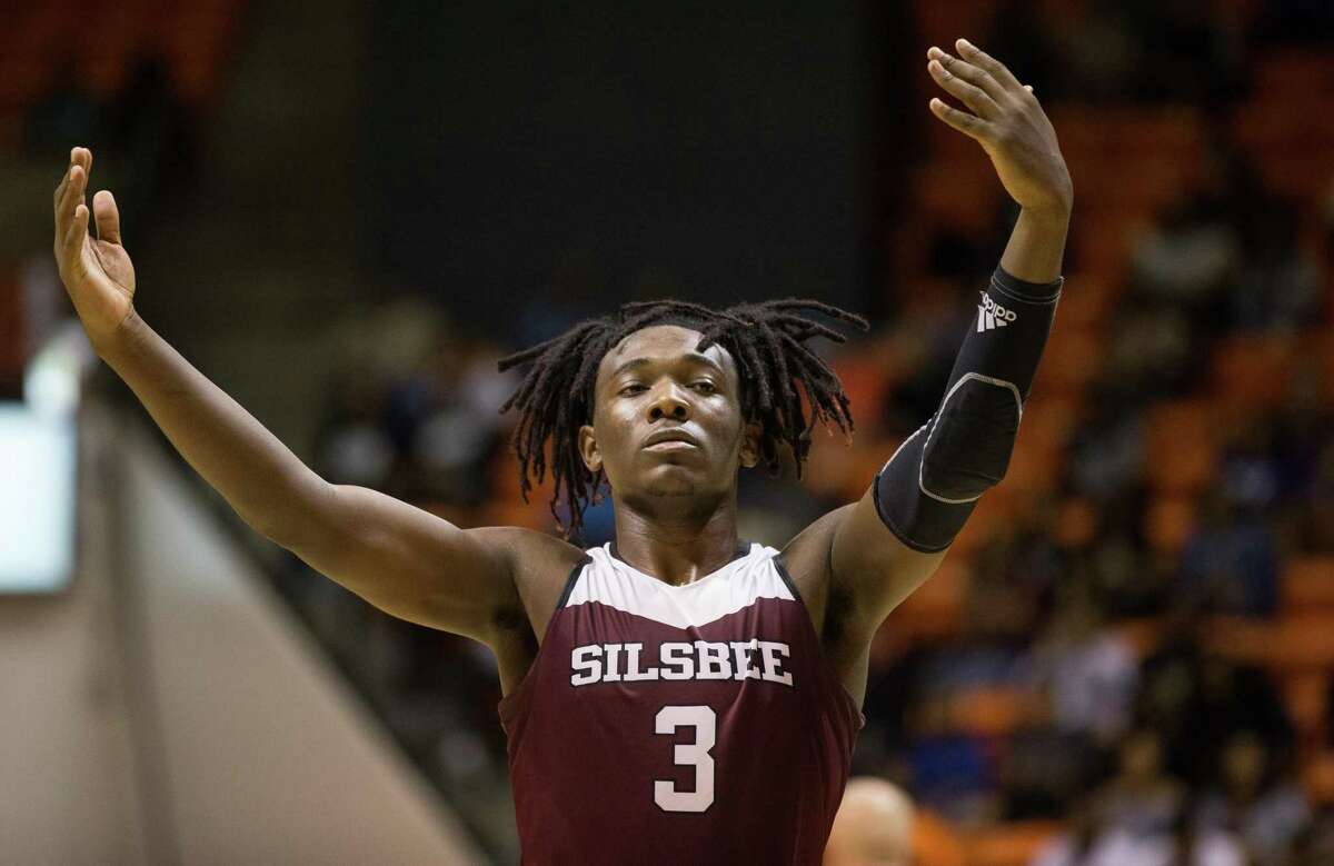Silsbee guard Devon McCain motions to the crowd during the second half of a 4A regional final game between the Jack Yates Lions and Silsbee Tigers at Johnson Coliseum in Huntsville, Texas on Saturday, March 3, 2018. The Silsbee Tigers won 120-103. ( Loren Elliott/ For the Houston Chronicle )