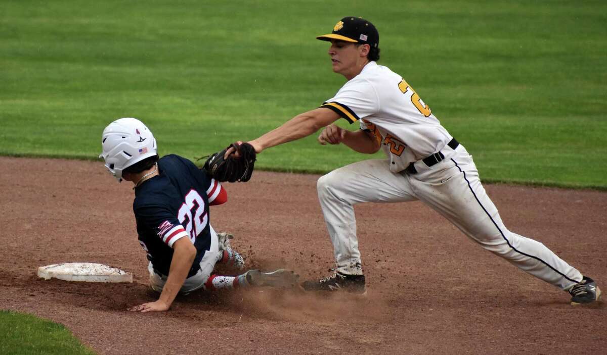 Avon's Lucas Lloyd slides into second safely during the Class L baseball semifinals at Palmer Field, Middletown on Tuesday, June 8, 2021.