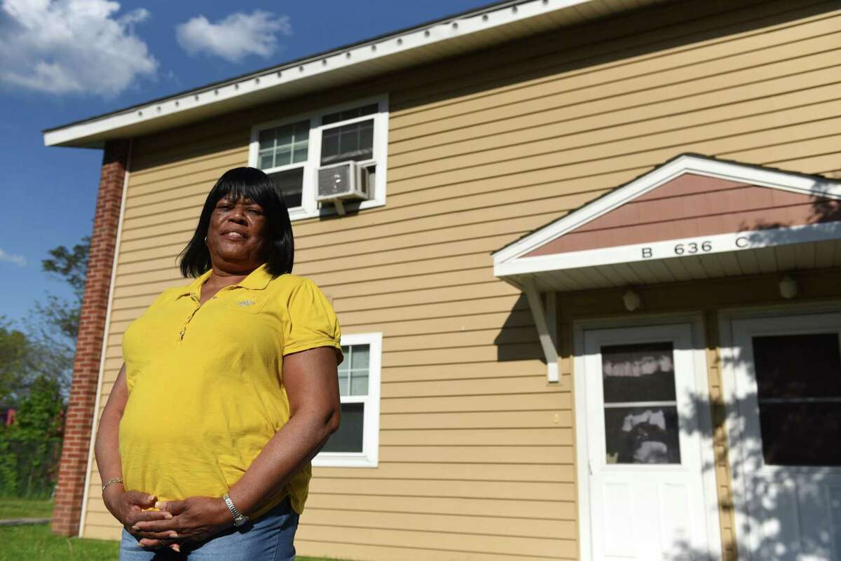 Gloria McKenzie stands outside her apartment at the Ezra Prentice Homes on Monday, May 17, 2021, in Albany, N.Y. (Will Waldron/Times Union)