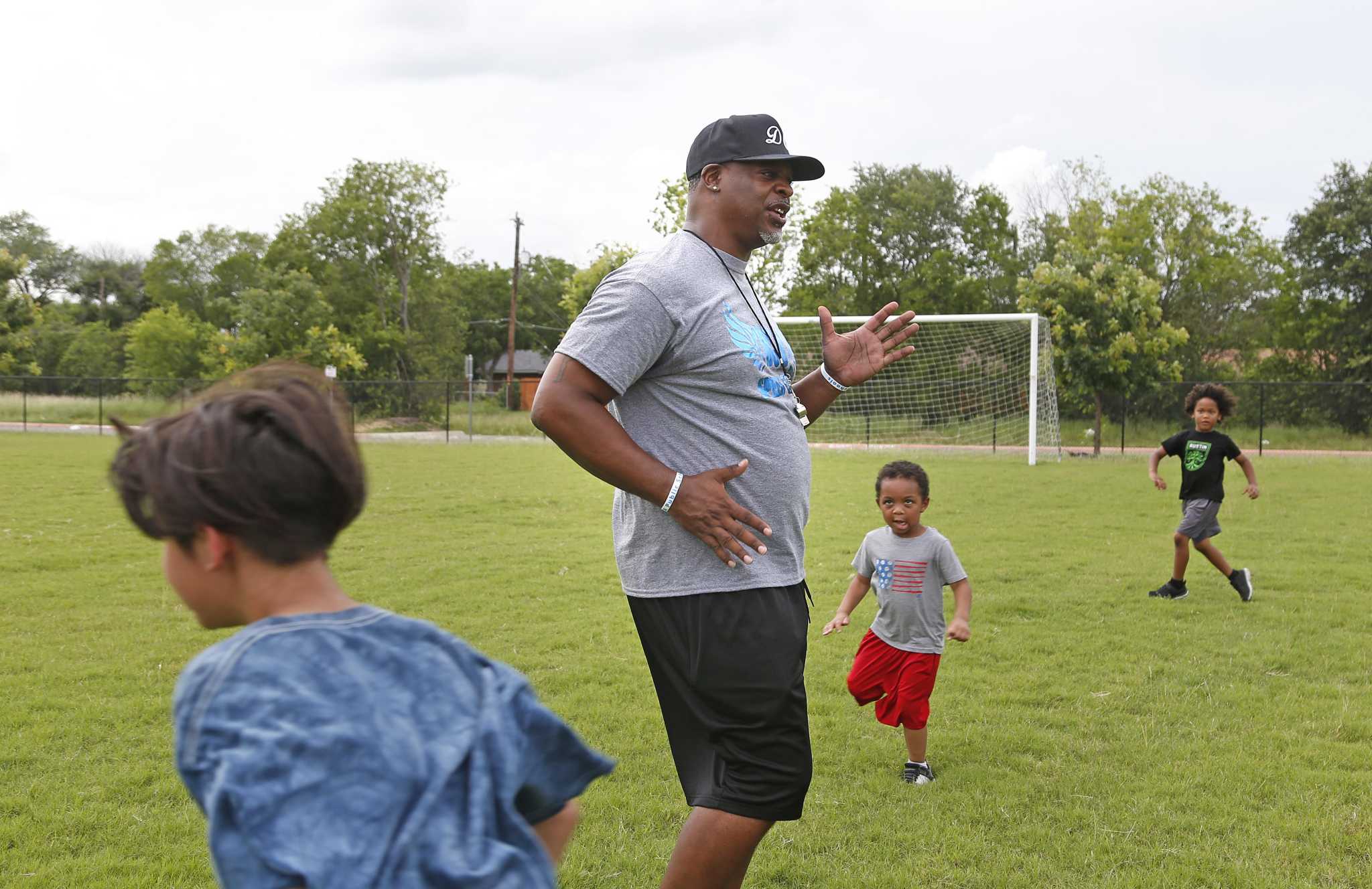 Cowboys receiver hosts football camp at JBSA > Joint Base San Antonio > News