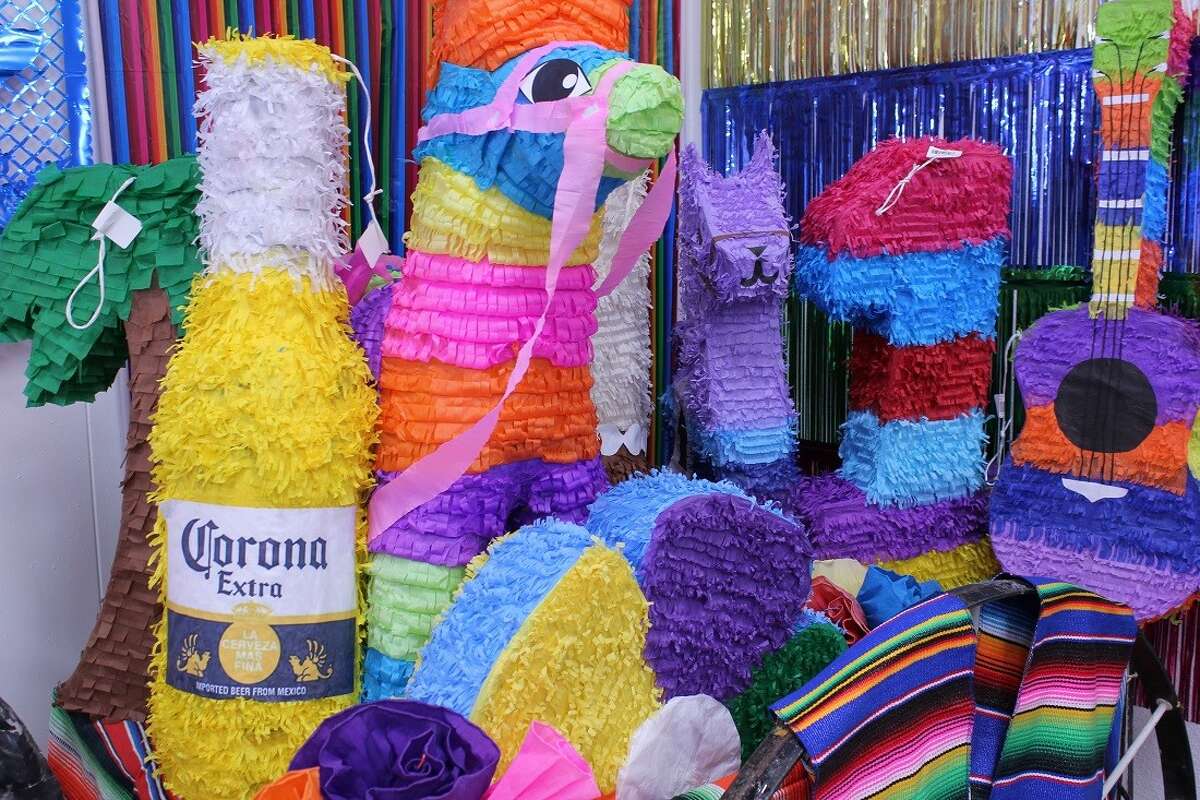 Corona beer bottle piñatas are Amols' hot item this year