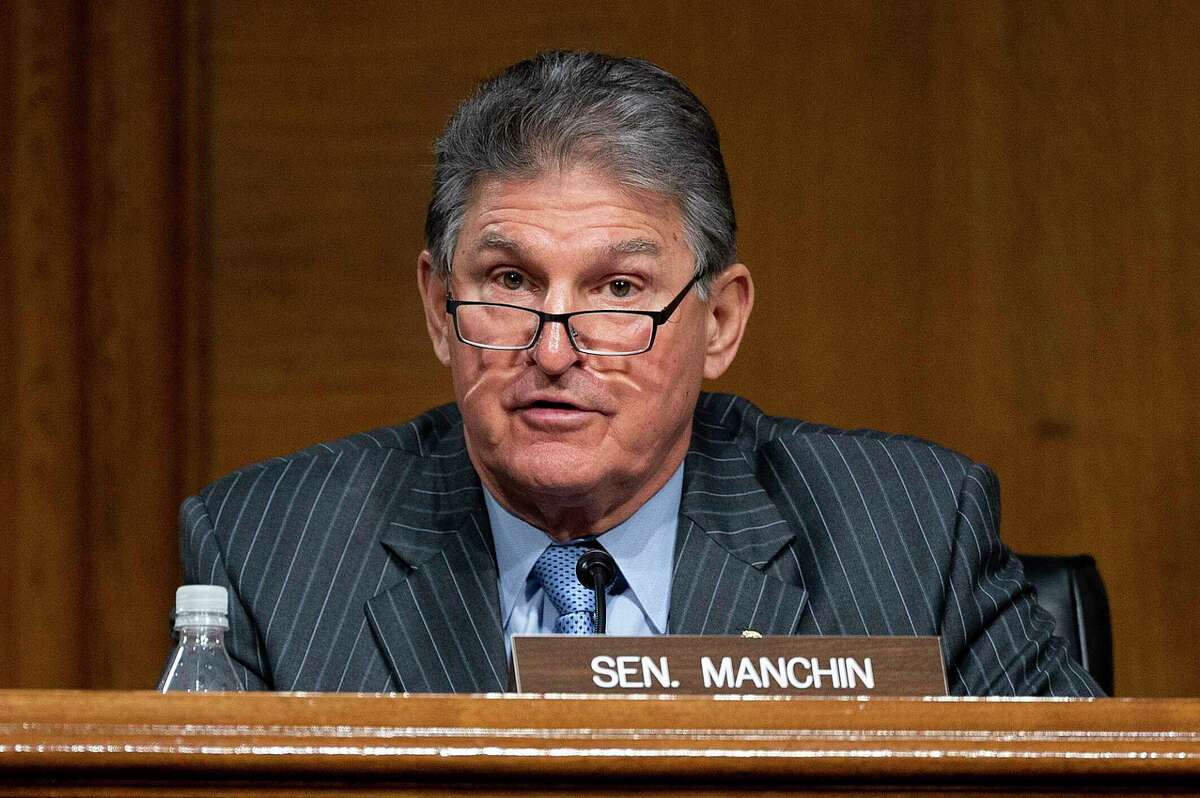 Committee Ranking Member Sen. Joe Manchin, D-WVa., speaks during a hearing to examine the nomination of former Gov. Jennifer Granholm, D-Mich., as she testifies before the Senate Energy and Natural Resources Committee during a hearing to examine her nomination to be Secretary of Energy, Wednesday, Jan. 27, 2021 on Capitol Hill in Washington. (Jim Watson/Pool via AP)