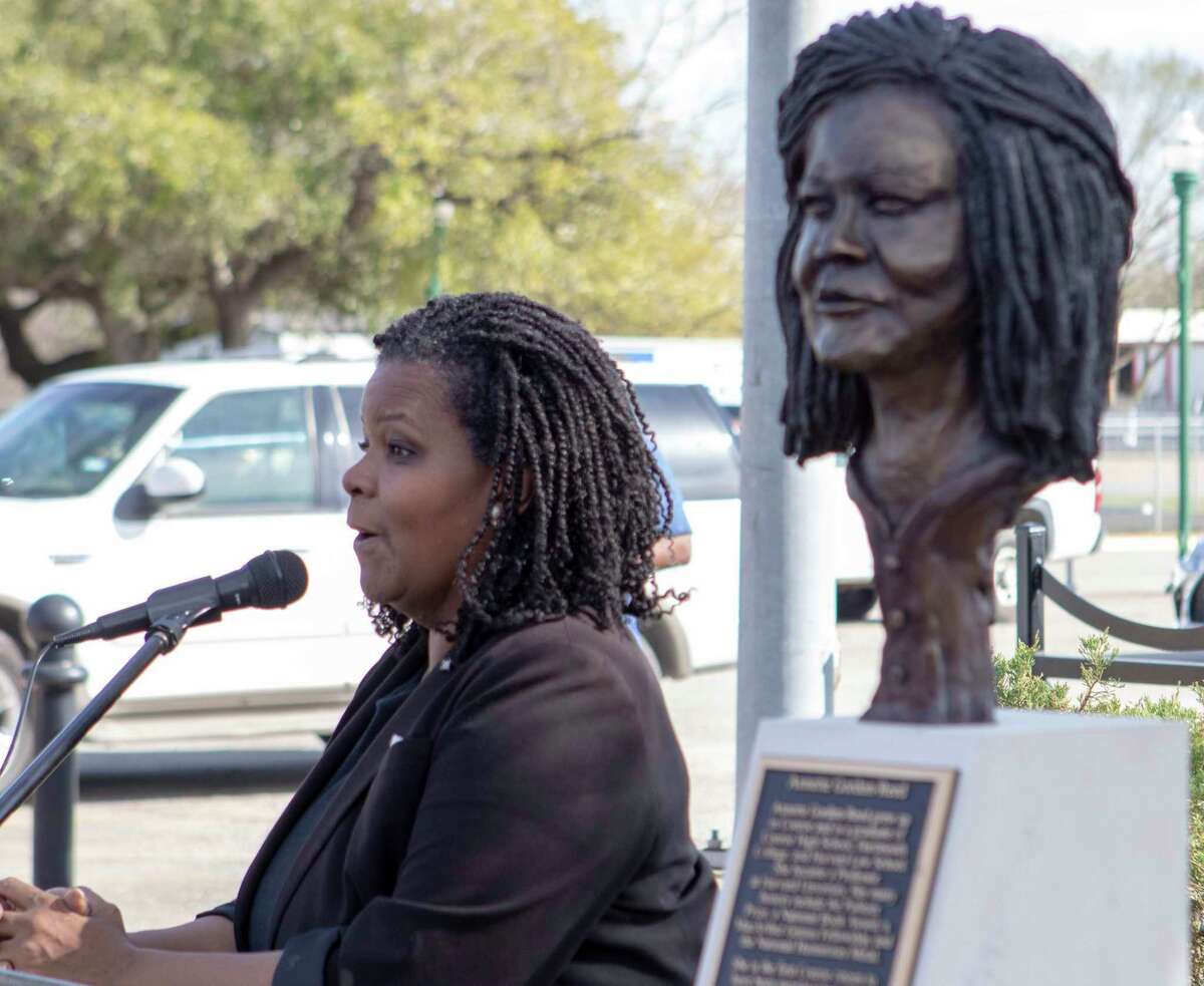 Pulitzer Prize-winning author Annette Gordon-Reed speaks about her childhood in Conroe and the changes since she sees now during an unveiling ceremony Friday, Feb. 15, 2019 at Founder’s Plaza park in Conroe.