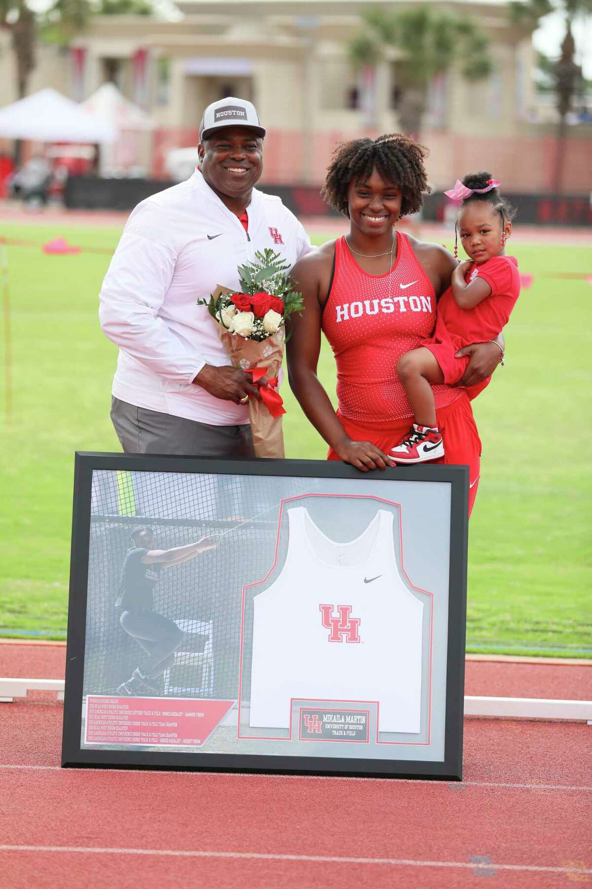 Mikaila Martin has balanced being a mother to Camryn, 3, and being an athlete at UH where she will compete in NCAA hammer throw this week.