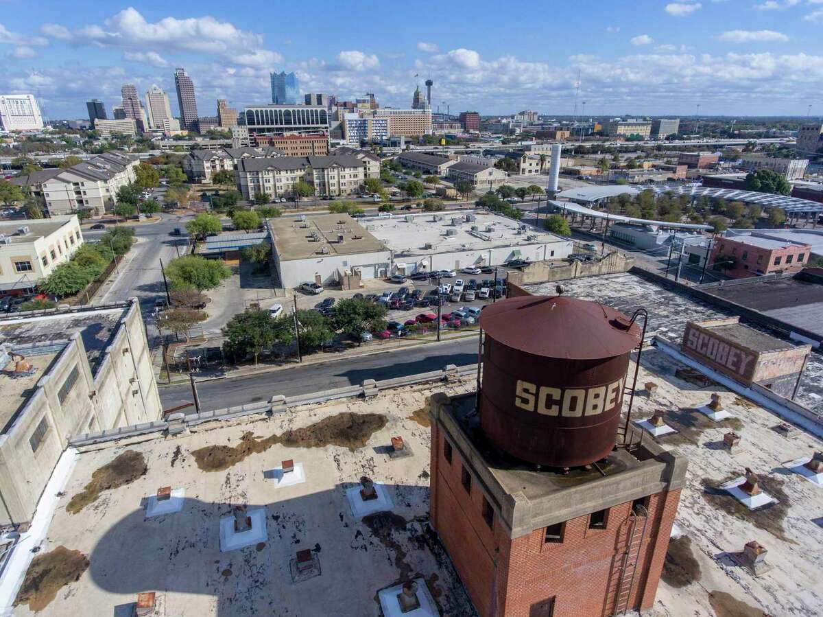 Downtown San Antonio is seen Nov. 23, 2020, behind the Scobey Moving and Storage complex on the city's near west side.