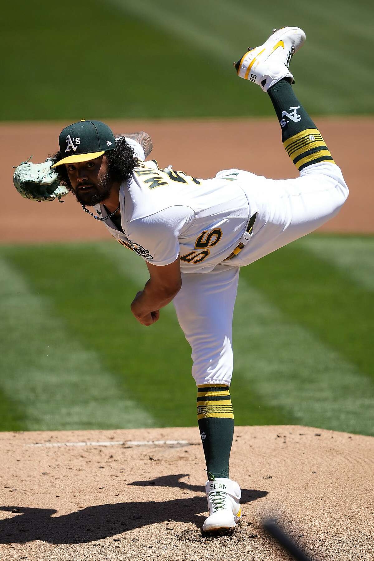 Oakland Athletics starting pitcher Sean Manaea throws against the Arizona Diamondbacks during the first inning of a baseball game Wednesday, June 9, 2021, in Oakland, Calif. (AP Photo/Tony Avelar)