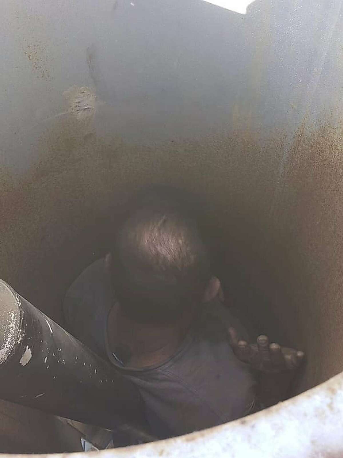 This photo provided by the Sonoma County Sheriff's Office shows a man who was found Tuesday, June 8, 2021 at a vineyard in Santa Rosa by a sheriff's deputy responding to a call about a suspicious vehicle parked in the area. Officials in Northern California rescued the man who said he had been trapped inside a large fan at a vineyard for two days. (Sonoma County Sheriff's Office via AP)