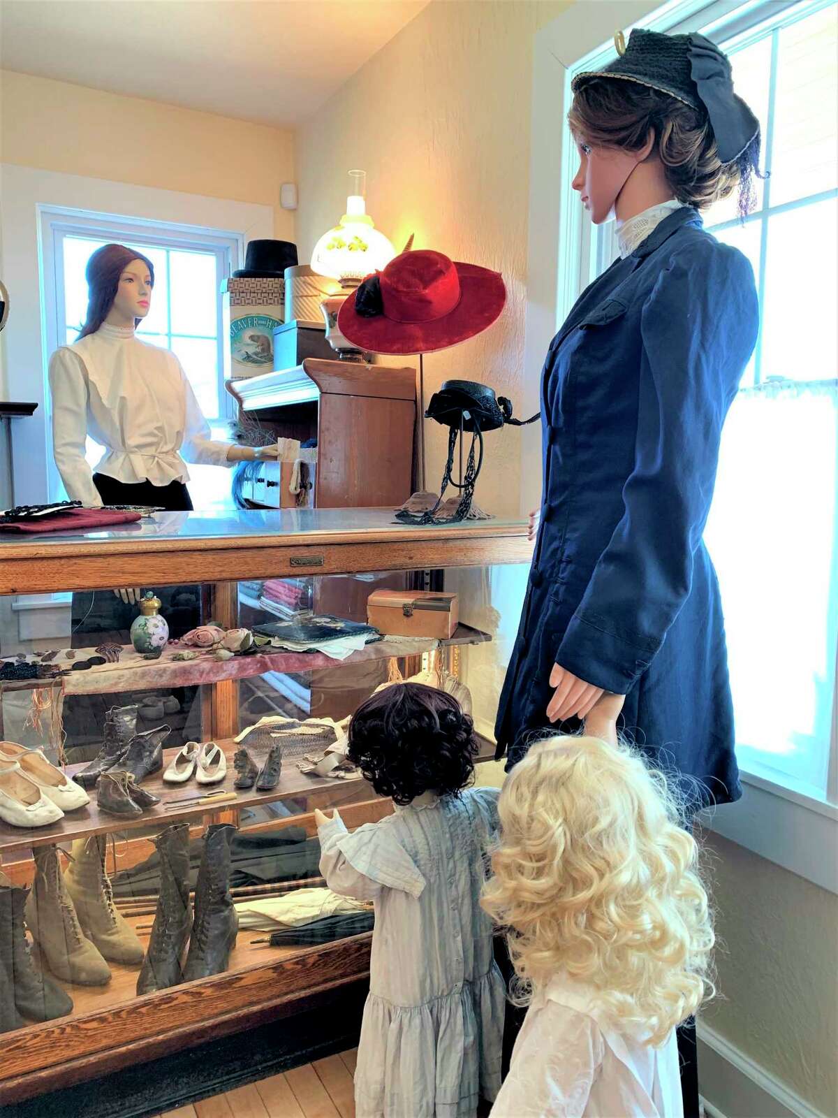 Pictured is a dressmaking exhibit from the 1890-1910 era that is on display at the Lake County Historical Museum and Research Library. (Courtesy photo)