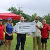Pictured left to right, DJ Mires and Kerri May, Adaptive Sports for Kids board members; Josh McQueen, senior manager, Energy Transfer Nederland Terminal; Hilton Kelly, founder, Community In-Power and Development Association; Allen Nation, president, Adaptive Sports for Kids