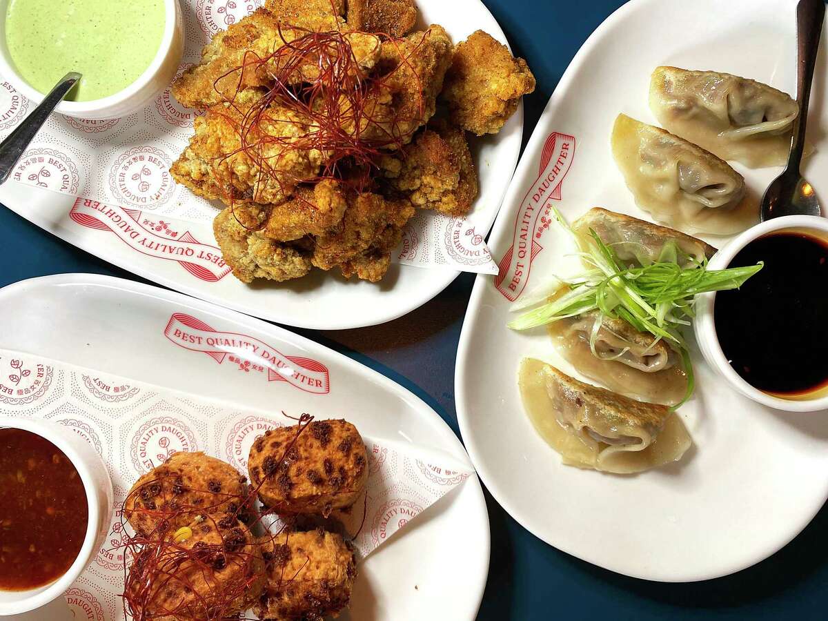 Appetizers include, clockwise from top left, Taiwanese popcorn fried chicken, vegan Impossible potstickers and mochi cheddar hush puppies at Best Quality Daughter.