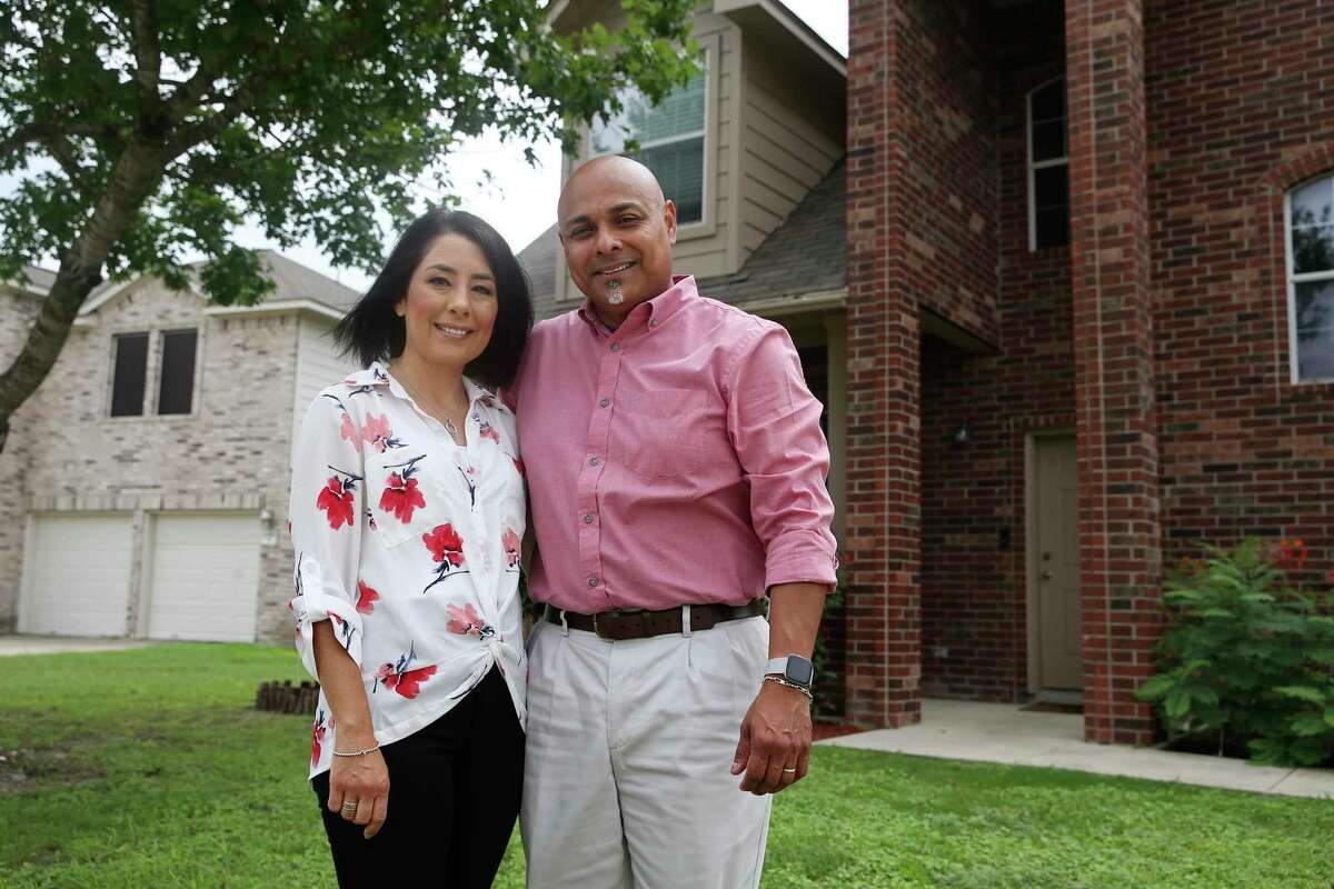 Rosalinda Montero and Rigoberto Montero at their home in New Braunfels. The couple contracted to build their dream home on an acre lot but the deal was terminated after they declined to pay about $50,000 more for the home to cover the rising cost of construction materials.