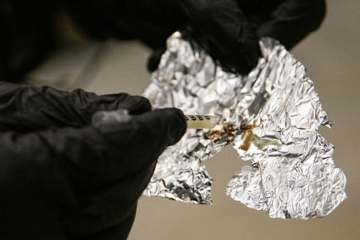 In this file photo, BART police officer Eric Hofstein displays the Fentanyl he confiscated while patrolling the Civic Center Station BART platform in San Francisco, Calif on November 20, 2020. 