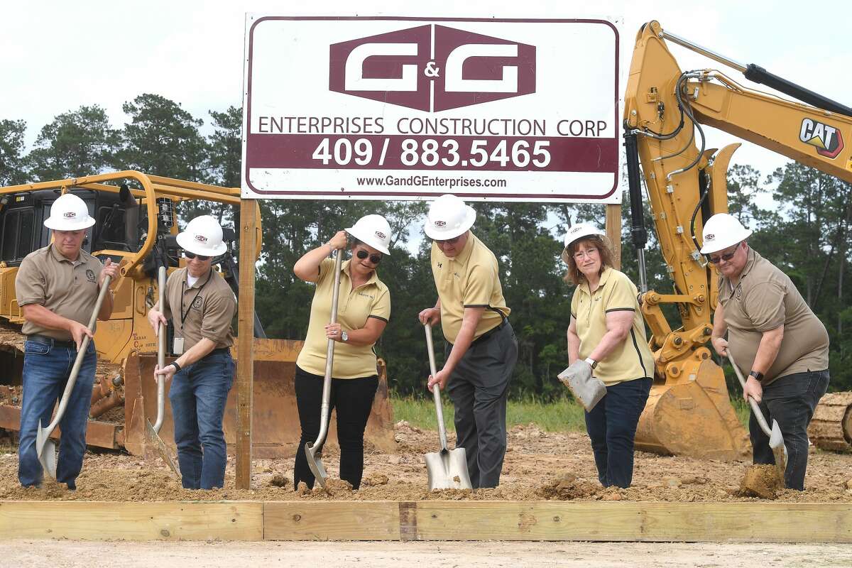 Members of Vidor ISD's school board gather for a groundbreaking ceremony on the long-awaited new Vidor Middle School Thursday. Students and teachers have been working out of portables since the school flooded during Harvey in 2017. Photo made Thursday, June 10, 2021 Kim Brent/The Enterprise