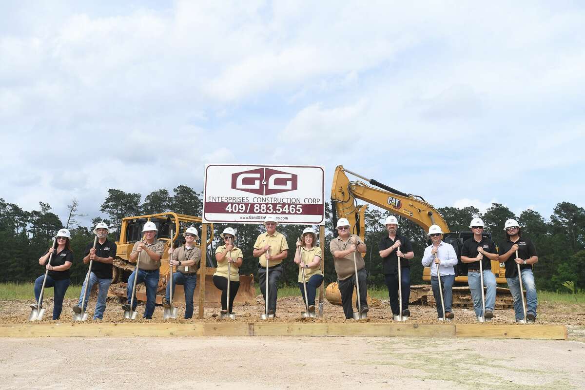 Members of Vidor ISD's school board and representatives from G&G Construction gather for a groundbreaking ceremony on the long-awaited new Vidor Middle School Thursday. Students and teachers have been working out of portables since the school flooded during Harvey in 2017. Photo made Thursday, June 10, 2021 Kim Brent/The Enterprise