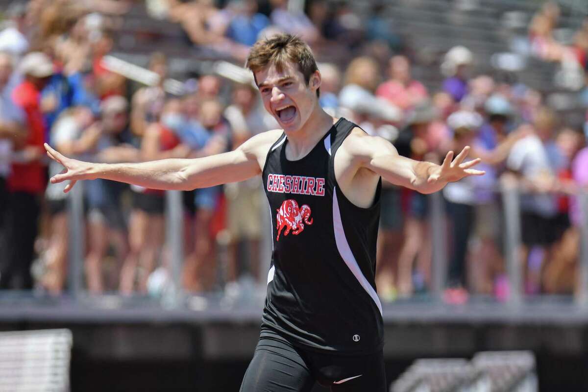 Ryan Farrell of Cheshire celebrates a victory of the 800 meter run during the CT State Open Track and Field Championship on June 10, 2021 at Willow Brook Park in New Britain, CT.