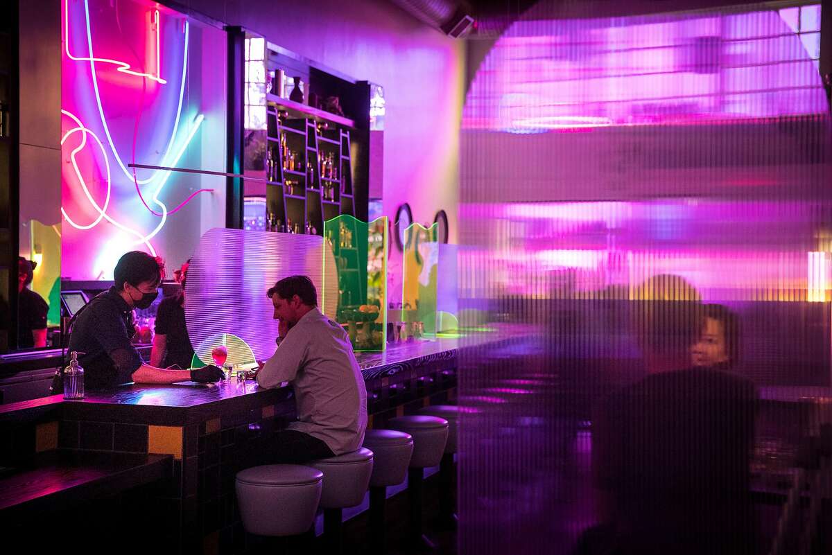 Vivid purple lighting appeared at several new Bay Area bars, such as Viridian in Oakland.