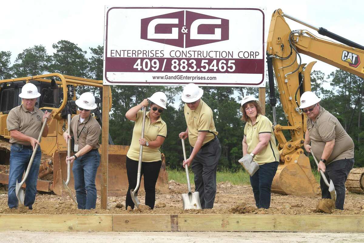 Members of Vidor ISD's school board gather for a groundbreaking ceremony on the long-awaited new Vidor Middle School Thursday. Students and teachers have been working out of portables since the school flooded during Harvey in 2017. Photo made Thursday, June 10, 2021 Kim Brent/The Enterprise