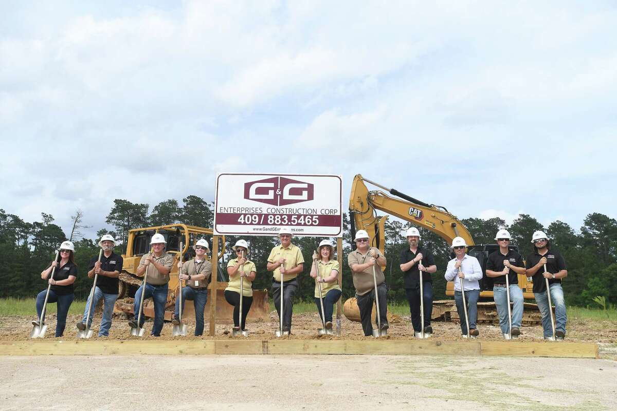 Members of Vidor ISD's school board and representatives from G&G Construction gather for a groundbreaking ceremony on the long-awaited new Vidor Middle School Thursday. Students and teachers have been working out of portables since the school flooded during Harvey in 2017. Photo made Thursday, June 10, 2021 Kim Brent/The Enterprise
