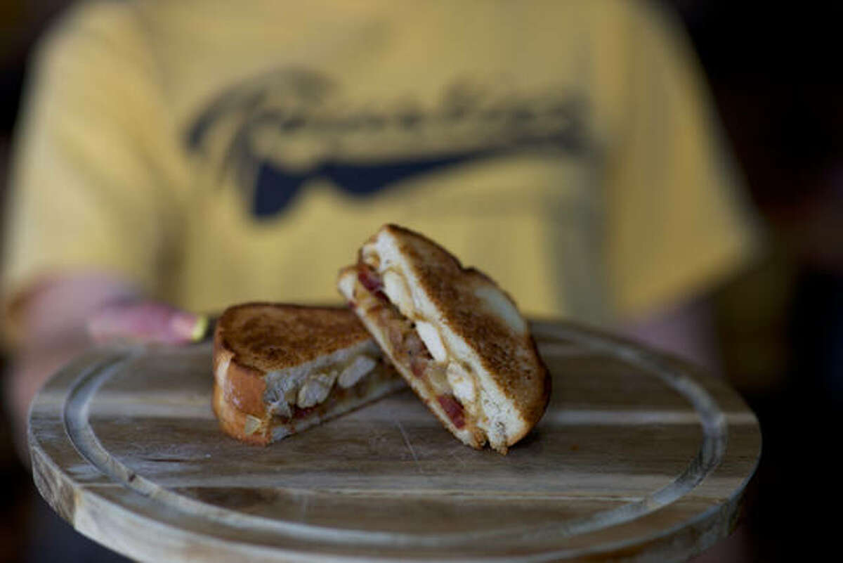 Toastiez Restaurant, featuring sandwiches like the Toastiez Chicken Bacon Hatch Cheese Sandwich, is planning a grand opening in Greenville on June 16.