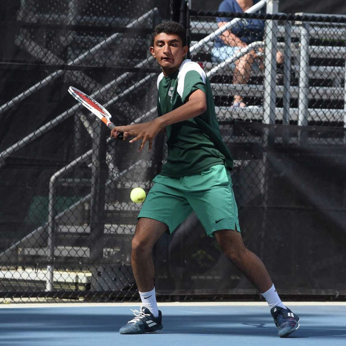 Norwalk’s Prem Dave returns during the CIAC boys tennis invitation competition at Weslyan University in Middletown, Conn. Thursday, June 10, 2021