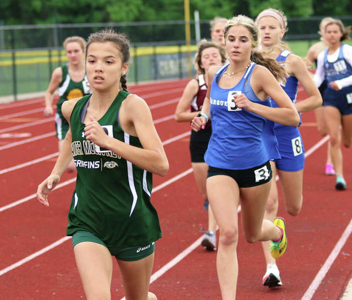 Father McGivney freshman Kaitlyn Hatley (front) leads runners in the 800 meters during the Althoff Class 1A Sectional June 2 in Belleville. On Thursday, Hatley became McGivney’s track first state medalist with a seventh-place finish in both the 800 and 1,600 in the state meet at Charleston.