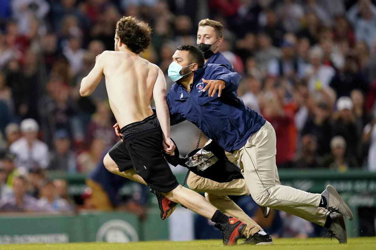 Two Astros Fans (Shirtless Cowboy Included) Run Onto the Field