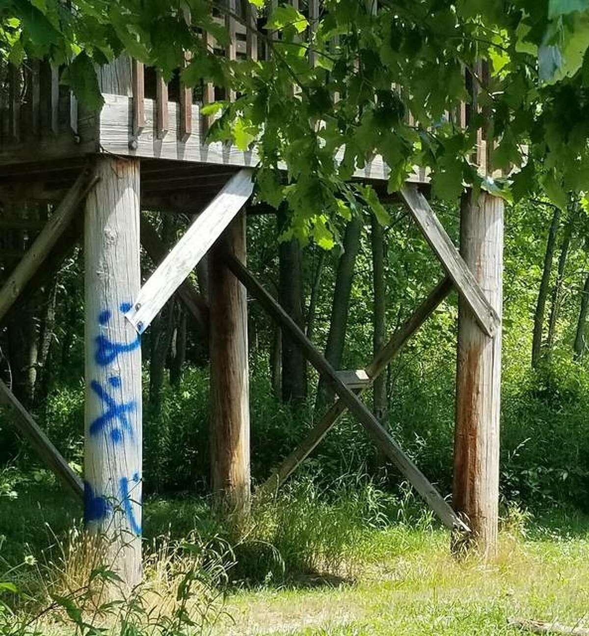 Graffiti appears on a portion of a wooden structure at the Watershed Nature Center, in Edwardsville. This Saturday’s Restoration Day is open to the public to voluntarily help maintain the center from 8 to 11 a.m. Check in at the Welcome Center upon arrival.