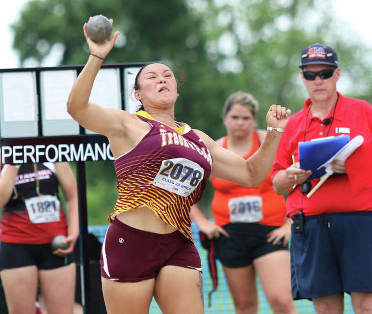 EA-WR senior Jayden Ulrich gets off her winning throw of 14.84 meters in her first attempt in the shot put at the Class 2A state meet Friday at O’Brien Stadium in Charleston. Ulrich won state championships in both the shot and discus.