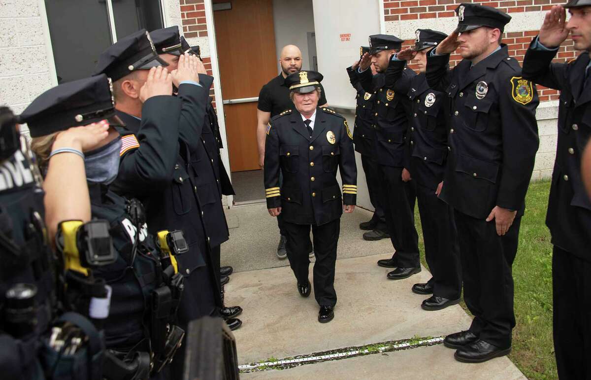 The Niskayuna Police Department honors outgoing Police Chief Frances Wall with a walk out ceremony outside the police department on Friday, June 11, 2021 in Niskayuna, N.Y. Wall in late 2021 filed a defamation suit against the town comptroller. (Lori Van Buren/Times Union)