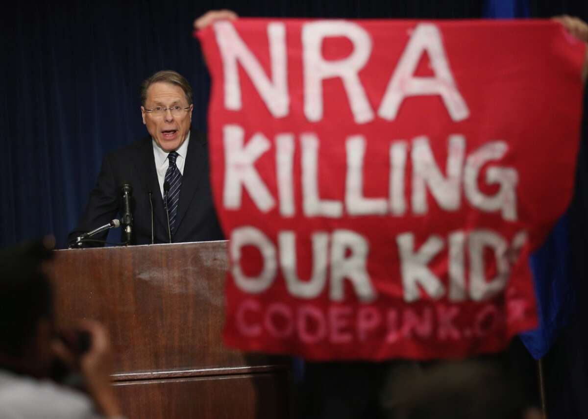 2012: NRA rejects gun controls after Sandy Hook massacre After 20 first-graders and six adults were shot to death at Sandy Hook Elementary School in Newtown, Connecticut, by a gunman using a semiautomatic weapon, the NRA again rejected demands for more gun control. The group's executive vice president, Wayne LaPierre, instead called for armed police officers in every school in the country and announced an NRA training program. The Washington Post reported some senior officials in the group thought it should take a less confrontational approach.