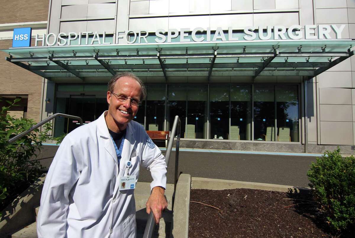 A CT doctor performed the first total wrist replacement surgery, culminating 30 years of work