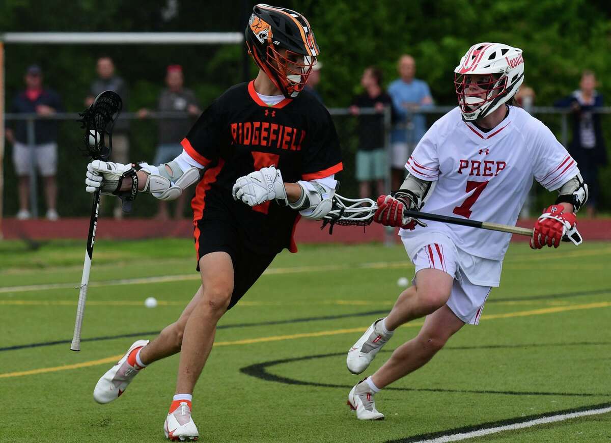 Jimmy McGrath (7) defends for Fairfield Prep during the Class L Boys Lacrosse championship game on Saturday, June 12, 2021, at Trumbull High School in Trumbull, Conn. McGrath died after being stabbed outside a Shelton residence late Saturday, May 14, 2022.