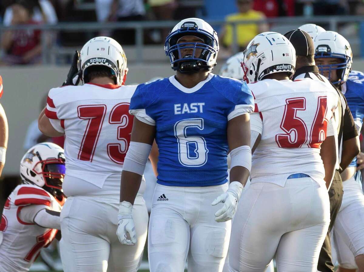East defensive back D'Juan Grant (6) from New Caney reacts after West advances on the field during the first quarter of the Bayou Bowl football all-star game at Stallworth Stadium, Saturday, June 12, 2021, in Baytown.