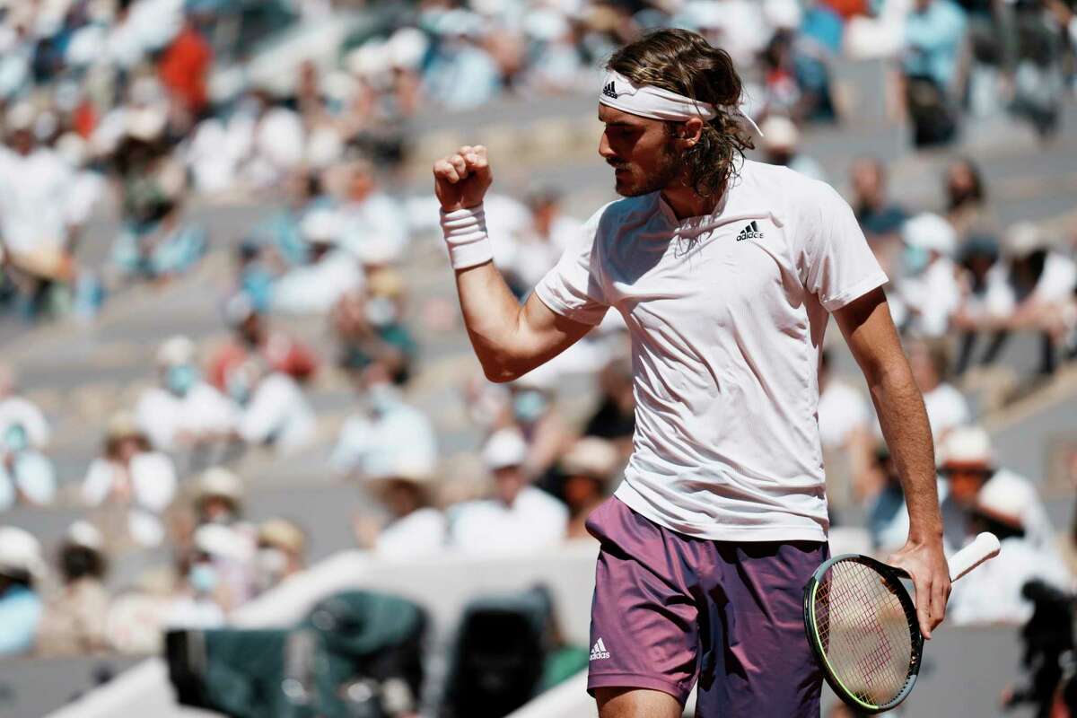Stefanos Tsitsipas of Greece reacts as he plays Serbia's Novak Djokovic during their final match of the French Open tennis tournament at the Roland Garros stadium Sunday, June 13, 2021 in Paris.