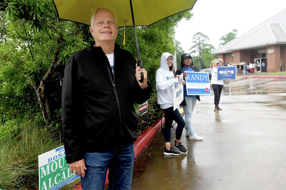 Mayoral candidate Roy West waits to greet voters as candidates and campaign workers make their final bid to voters on election day Saturday. Photo made Saturday, May 1, 2021 Kim Brent/The Enterprise