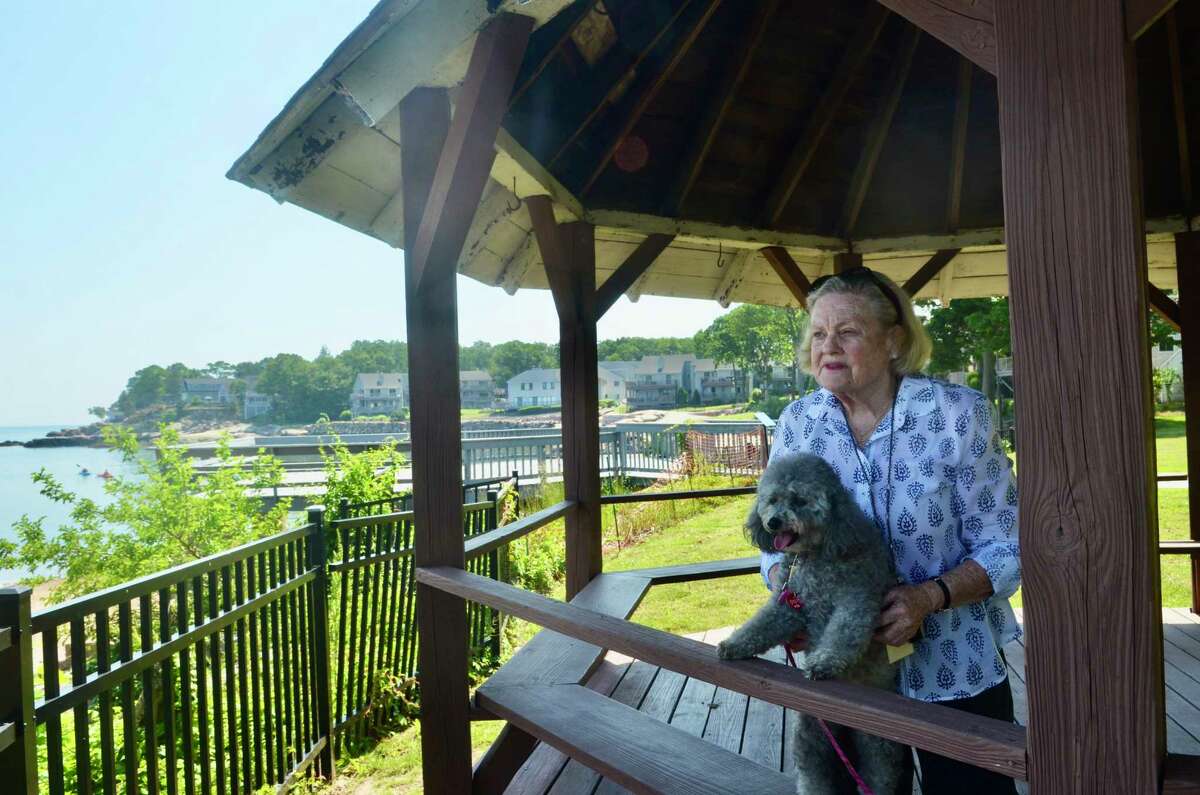 Susie Gowrie and her half-poodle Peaches at Connecticut Hospice.