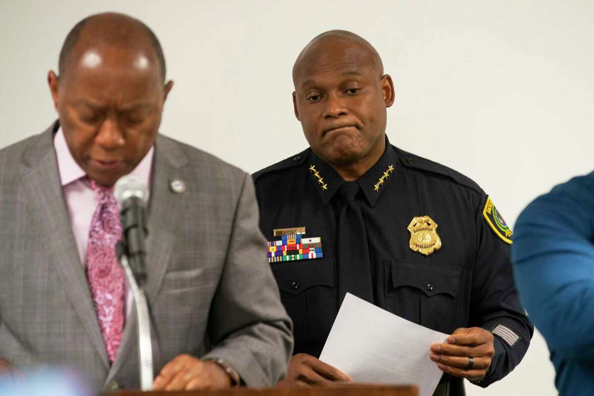 Houston Police Department Chief Troy Finner listens to Houston Mayor Sylvester Turner during a press conference releasing body-worn camera footage of a May 21st officer-involved shooting at a traffic stop, Thursday, June 3, 2021, inside a conference room in HPD's downtown office in Houston.