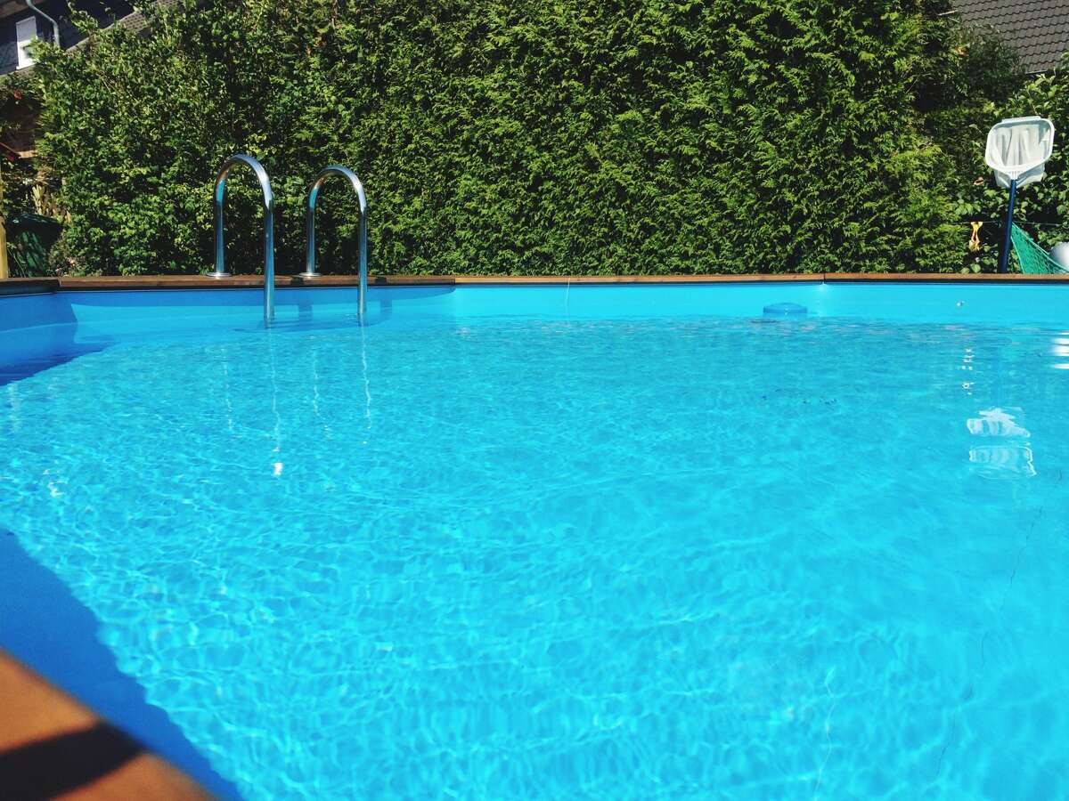 Pictured: Stock image of a pool on a summer day. Pool sharing platforms like Swimply and Swimmy operate like Airbnb, connecting guests to hosts who are offering their pools up for rent. Swimply and Swimmy charge guests an hourly rate to reserve a pool, and guests can reserve a pool for a few hours or for an entire day. 