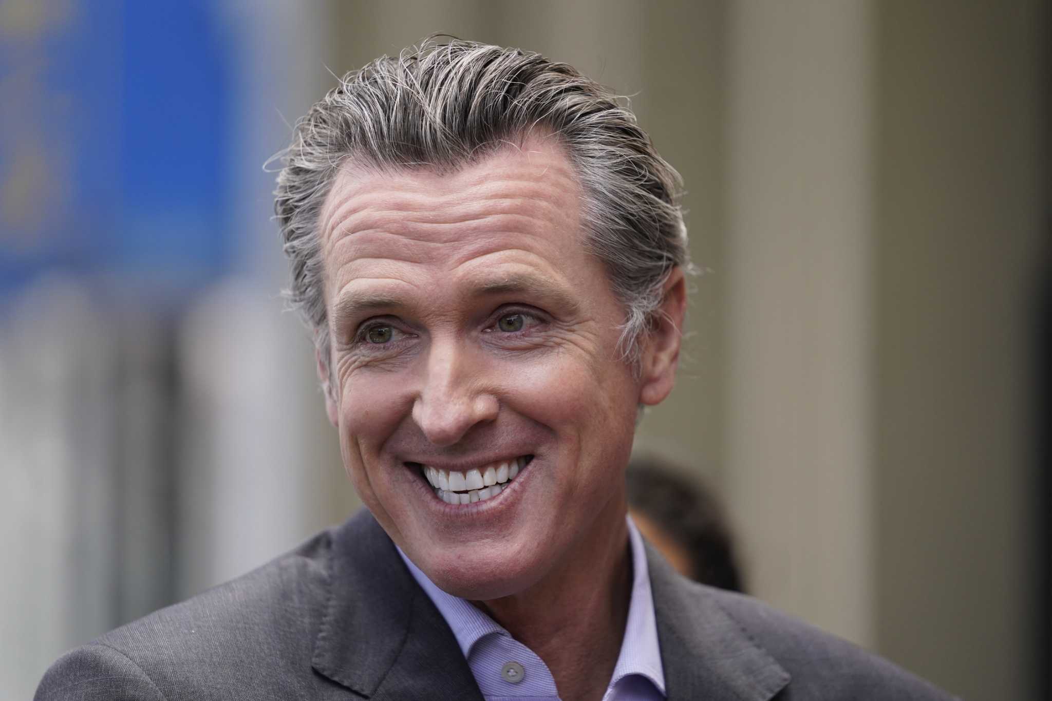 California Gov. Gavin Newsom smiles during a news conference in San Francisco, on Thursday, June 3, 2021. Newsom has signed an executive order that wi