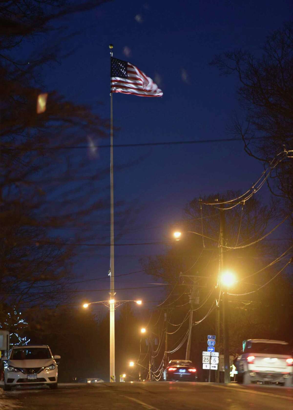 Newtown flagpole, Route 25, Newtown, Conn, on Wednesday night, December 13, 2017,