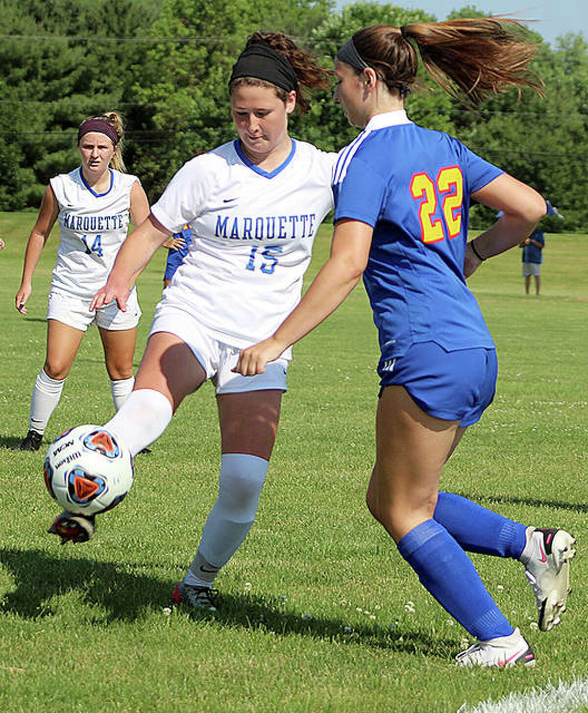 Madelyn Smith of Marquette (15) controls the ball in last week’s sectional championship game.