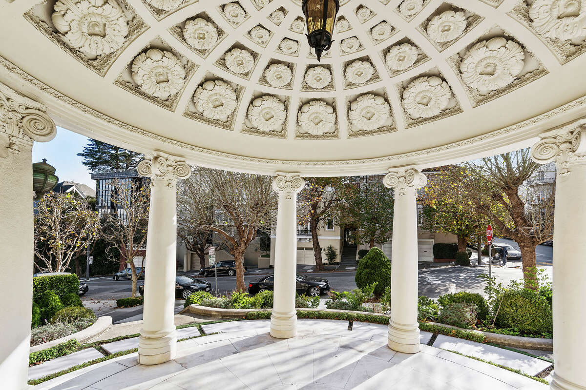 Looking back toward Pacific Avenue with the portico overhead, there's intricate lace-like carving in the marble. 
