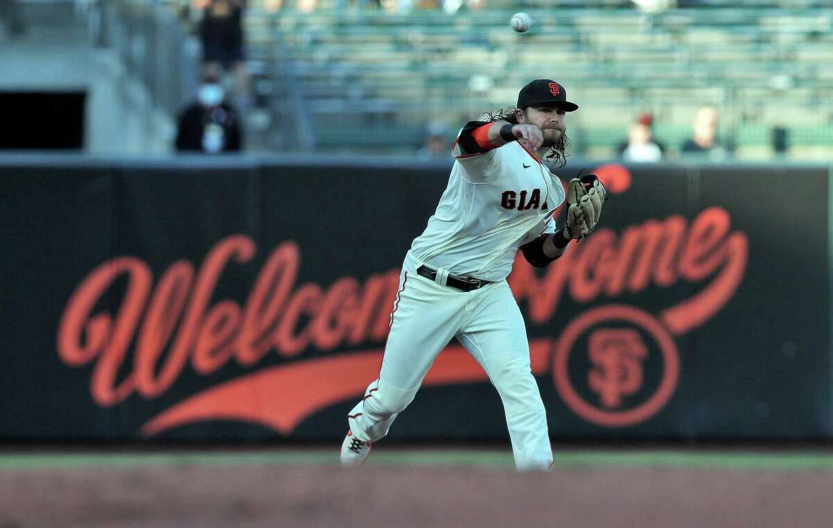 Brandon Crawford (35) throws to first in the first inning as the San Francisco Giants played the Arizona Diamondbacks at Oracle Park in San Francisco, Calif., on Monday, June 14, 2021.