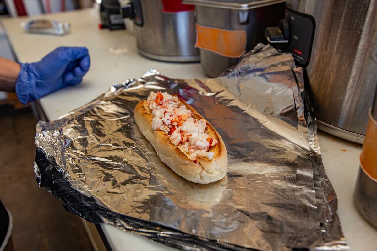 A freshly-made hot lobster roll at Lobster Landing in Clinton, Conn., on May 27, 2021.